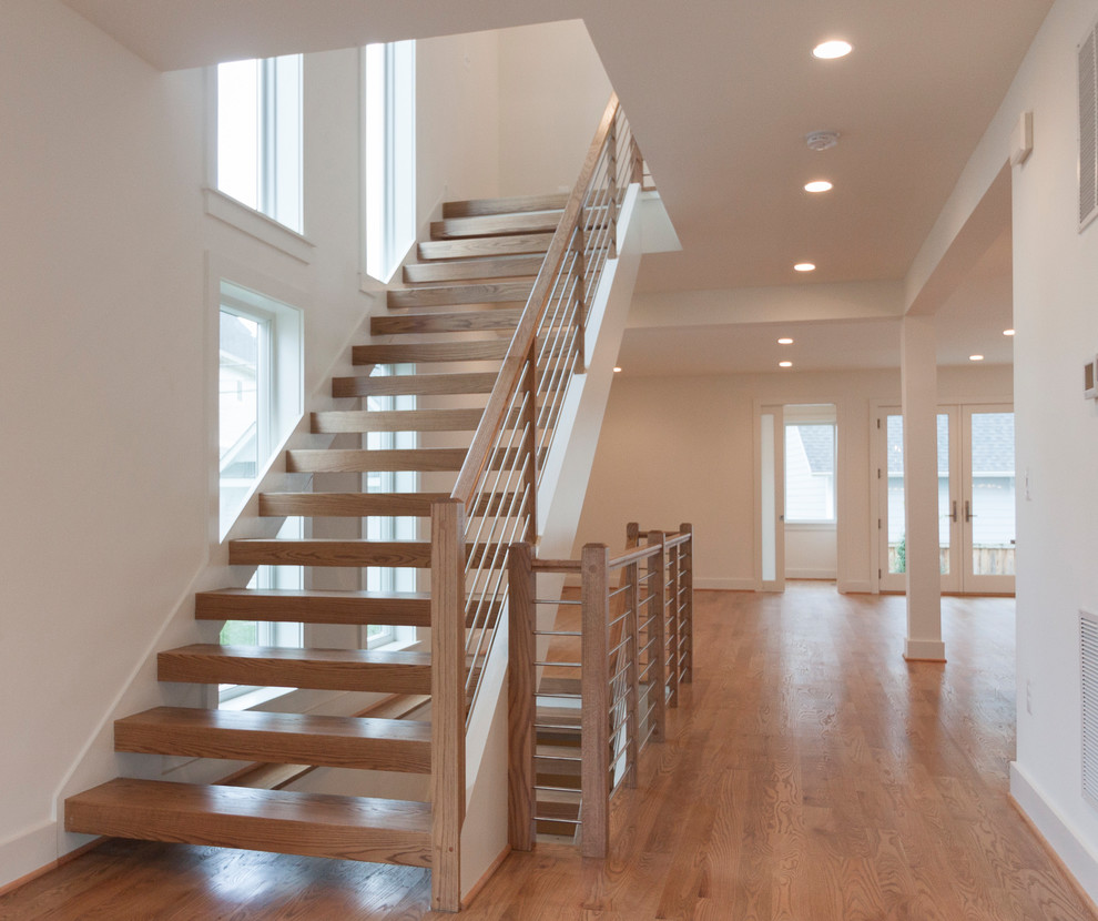 Staircase - large contemporary wooden floating mixed material railing staircase idea in DC Metro