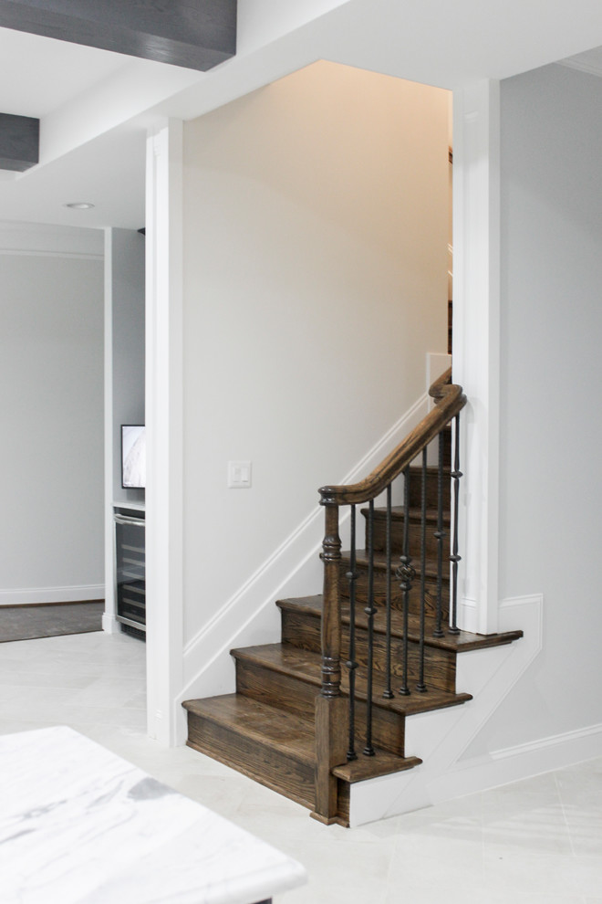 Staircase - large contemporary wooden curved mixed material railing staircase idea in DC Metro with wooden risers