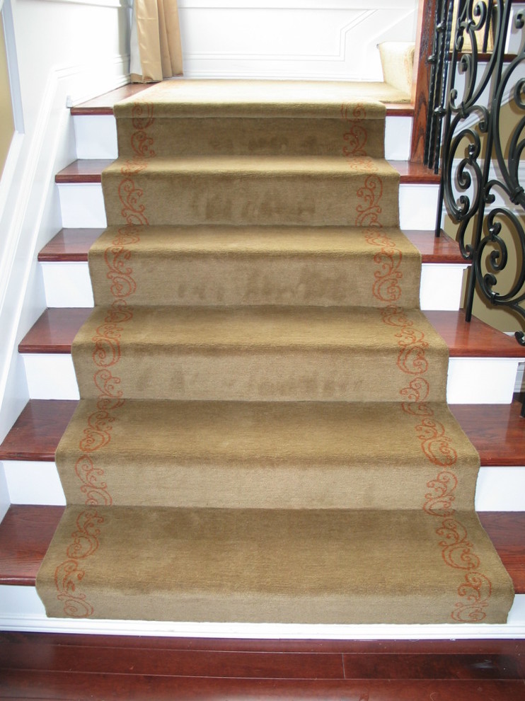 Staircase - large traditional wooden l-shaped staircase idea in New York with painted risers