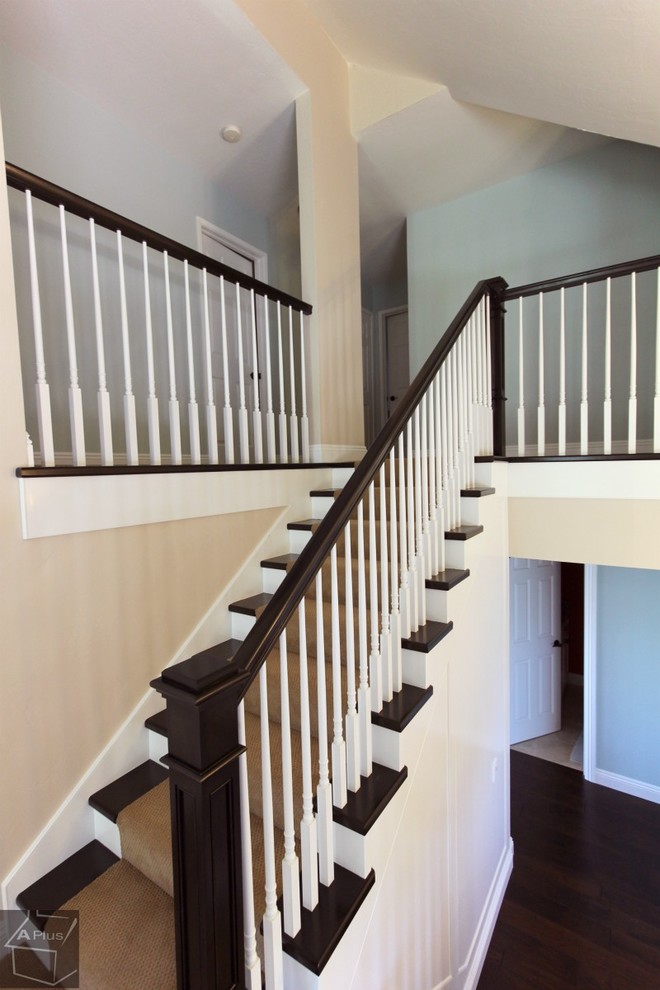 Staircase - mid-sized traditional carpeted straight staircase idea in Orange County with carpeted risers