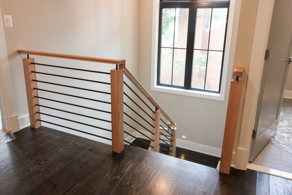 Réalisation d'un escalier bohème en U de taille moyenne avec des marches en bois, des contremarches en bois et un garde-corps en matériaux mixtes.