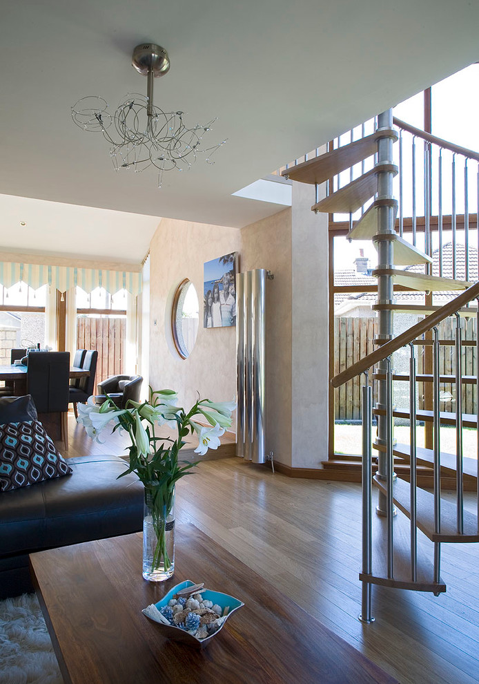 Inspiration for a contemporary wood straight staircase in Other with open risers.