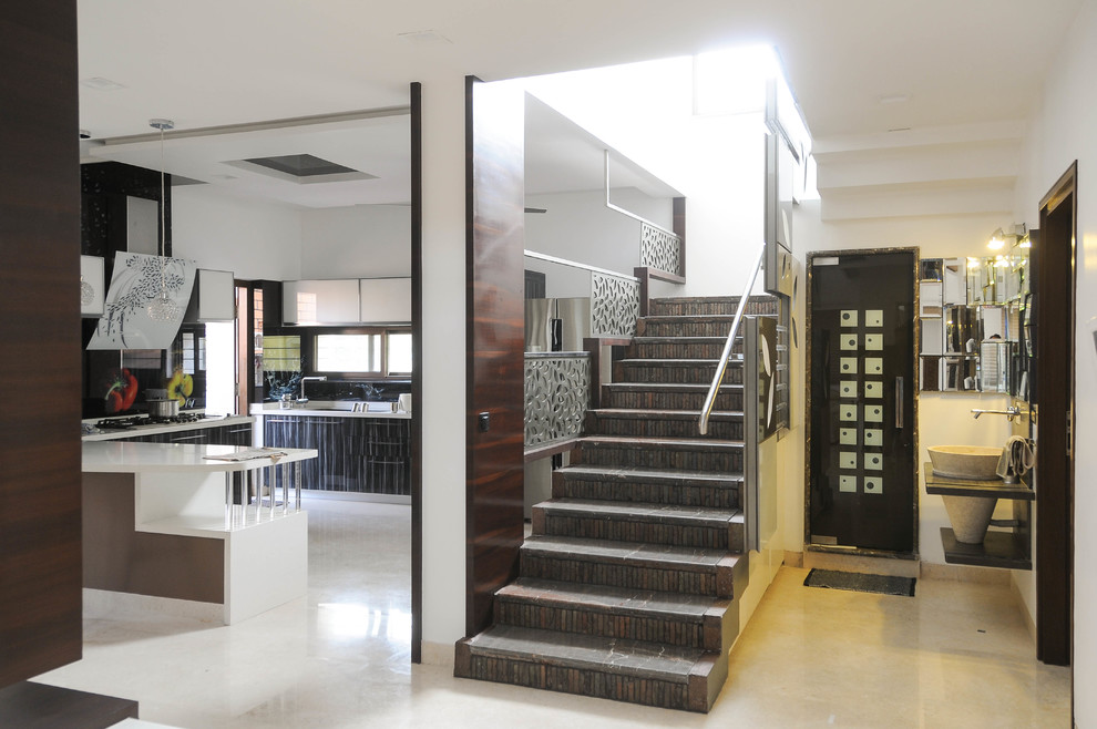 This is an example of a contemporary staircase in Hyderabad.