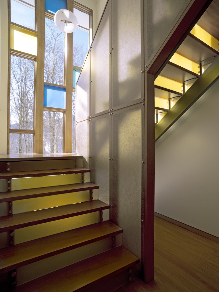 This is an example of a contemporary staircase in Burlington with open risers.