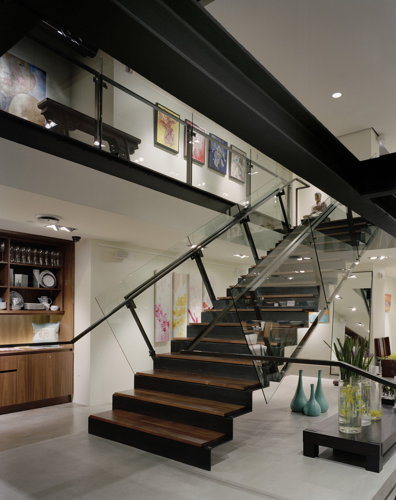 Example of a trendy wooden straight staircase design in Seattle