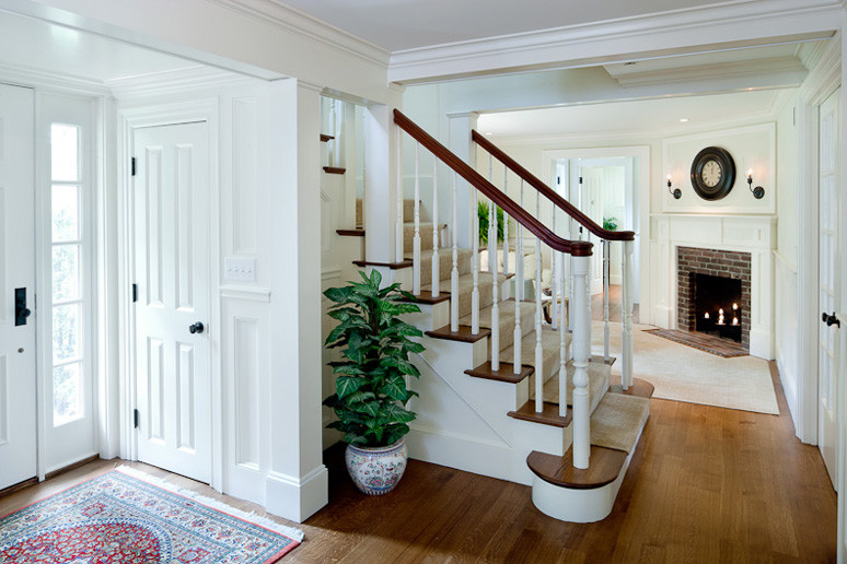 Mid-sized elegant wooden straight staircase photo in Boston with wooden risers