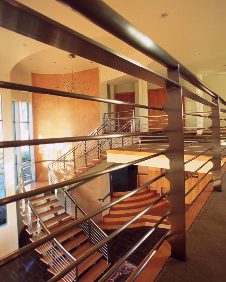 Inspiration for a huge modern wooden u-shaped open and mixed material railing staircase remodel in San Francisco