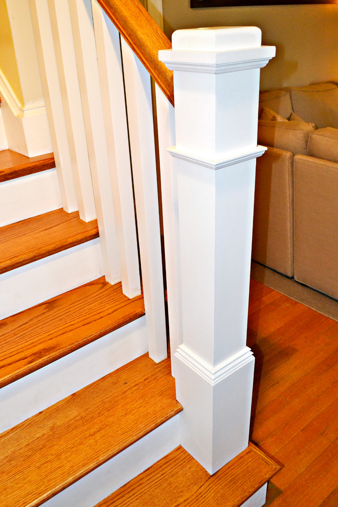 Design ideas for a medium sized classic wood straight staircase in Cincinnati with painted wood risers.