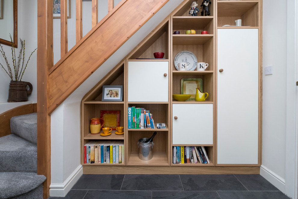 Design ideas for a classic staircase in Cardiff with under stair storage.
