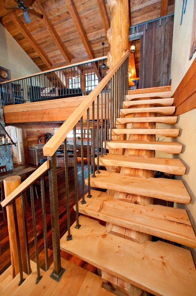 Imagen de escalera en L rústica sin contrahuella con escalones de madera