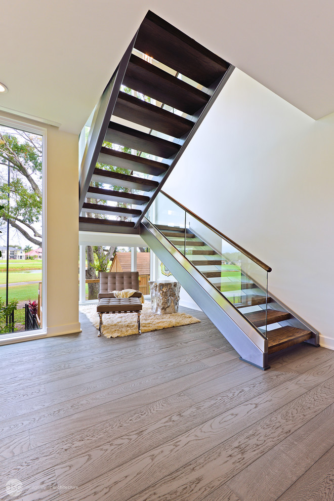 Staircase - large contemporary wooden u-shaped open staircase idea in Tampa