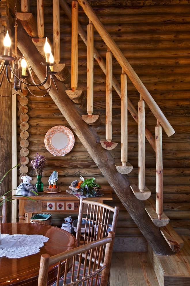 Diseño de escalera recta rural sin contrahuella con escalones de madera
