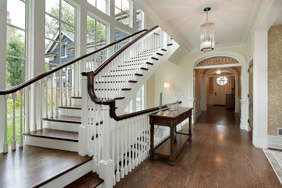 Inspiration for a timeless wooden staircase remodel in Chicago