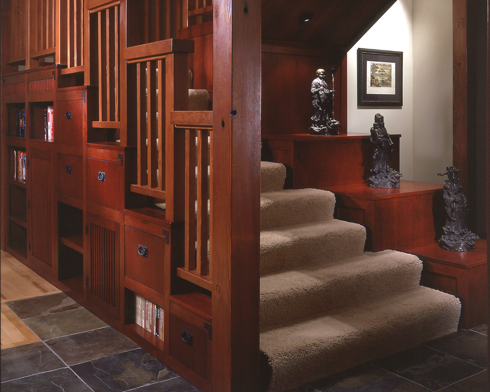 Mid-sized arts and crafts carpeted l-shaped staircase photo in Seattle with carpeted risers