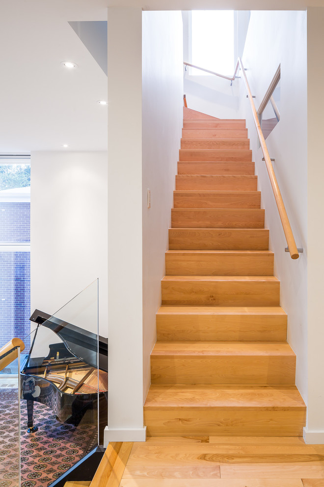 Inspiration for a contemporary wood l-shaped staircase in Ottawa with wood risers.