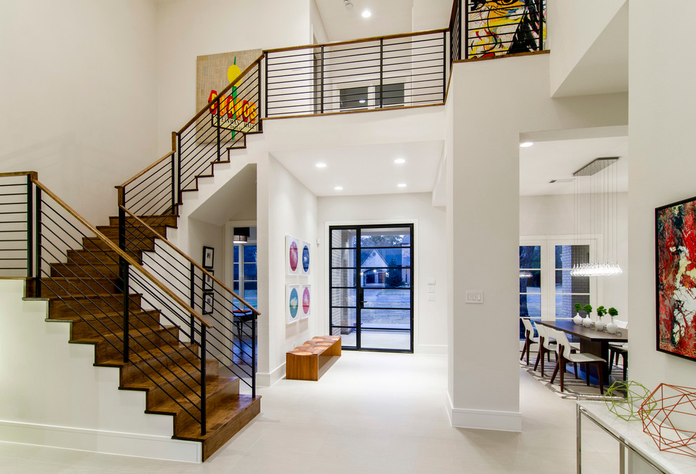 Contemporary wood staircase in Dallas with wood risers.
