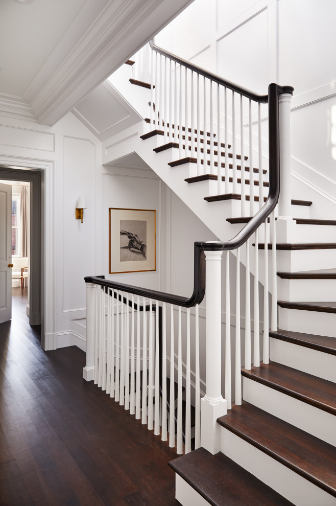 Example of a transitional wooden wood railing staircase design in Boston