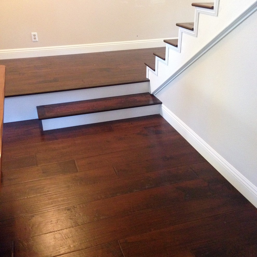 Inspiration for a mid-sized timeless painted straight staircase remodel in Orange County with painted risers