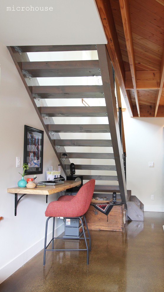 Small transitional wooden straight open staircase photo in Seattle