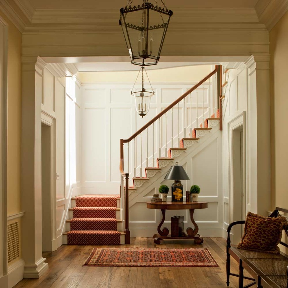 Mid-sized farmhouse wooden u-shaped staircase photo in DC Metro with painted risers