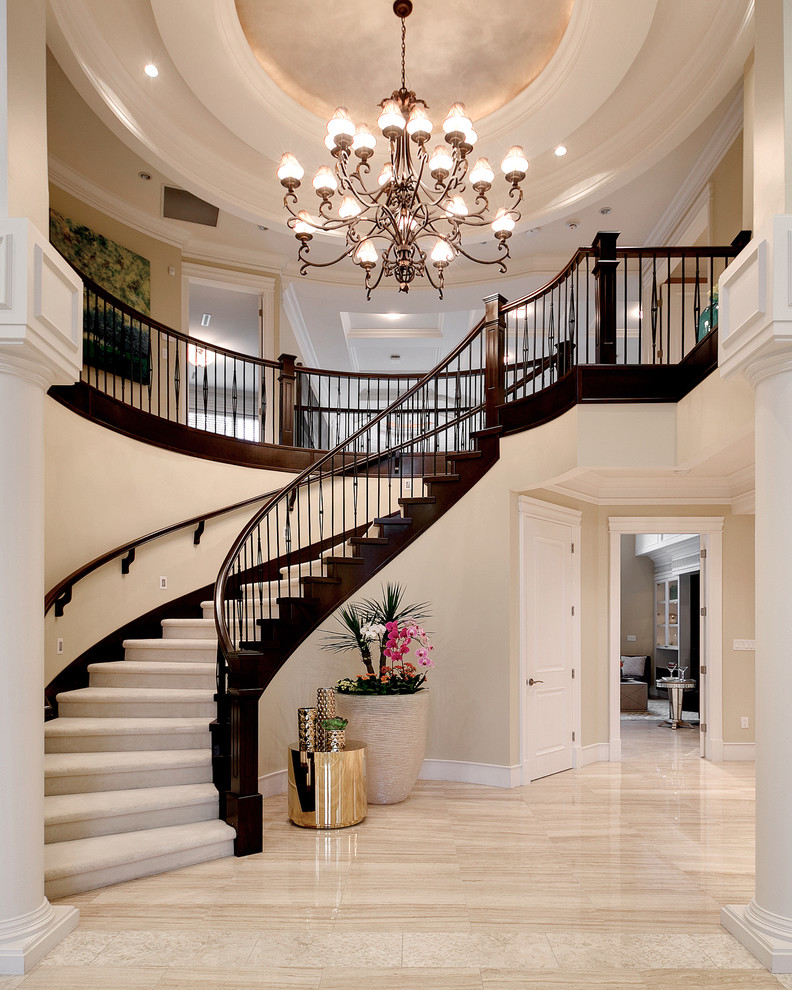 Inspiration for a timeless wooden curved wood railing staircase remodel in Vancouver with wooden risers