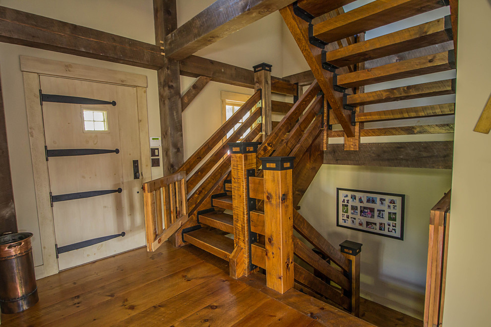 Modelo de escalera campestre de tamaño medio sin contrahuella con escalones de madera y barandilla de madera