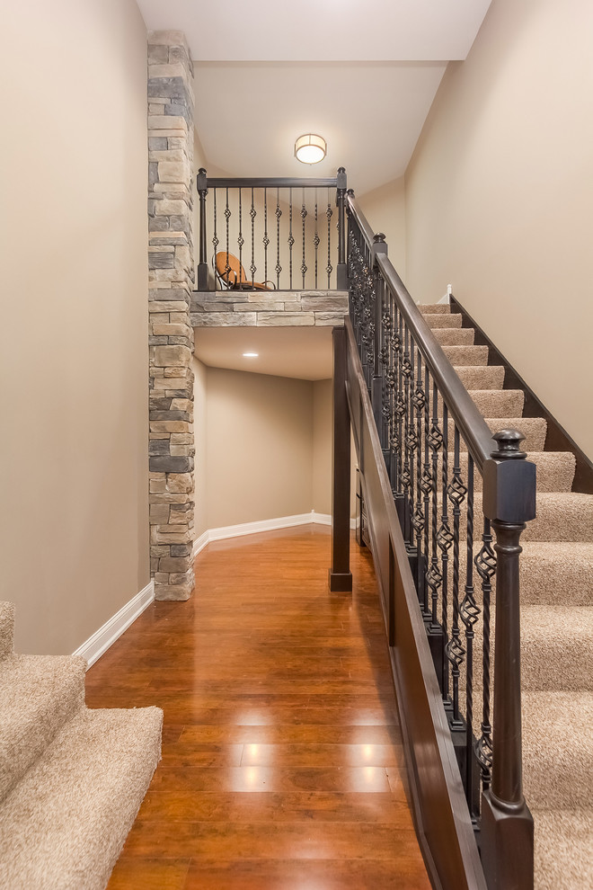 Design ideas for a medium sized traditional carpeted straight wood railing staircase in Chicago with carpeted risers.
