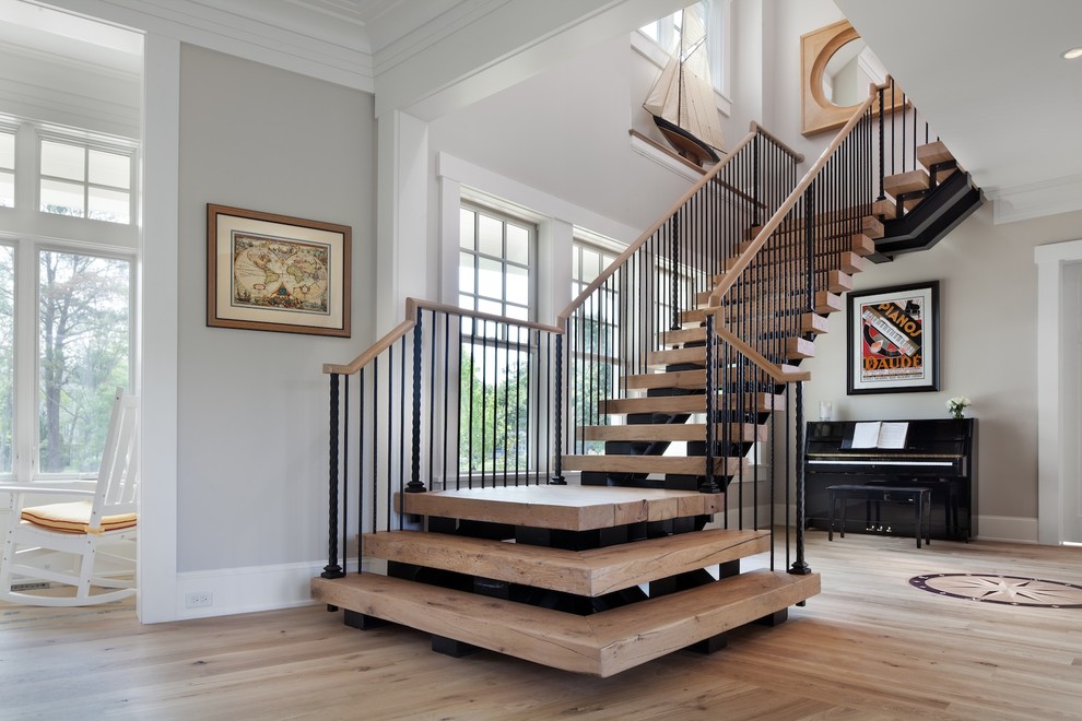 Inspiration for a large beach style wood l-shaped staircase in DC Metro with wood risers.