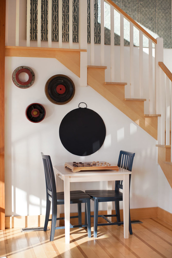 Inspiration for a nautical wood l-shaped staircase in Boston with wood risers.