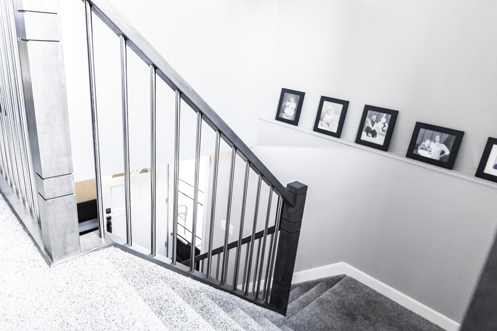 This is an example of a classic carpeted l-shaped mixed railing staircase in Edmonton with carpeted risers.