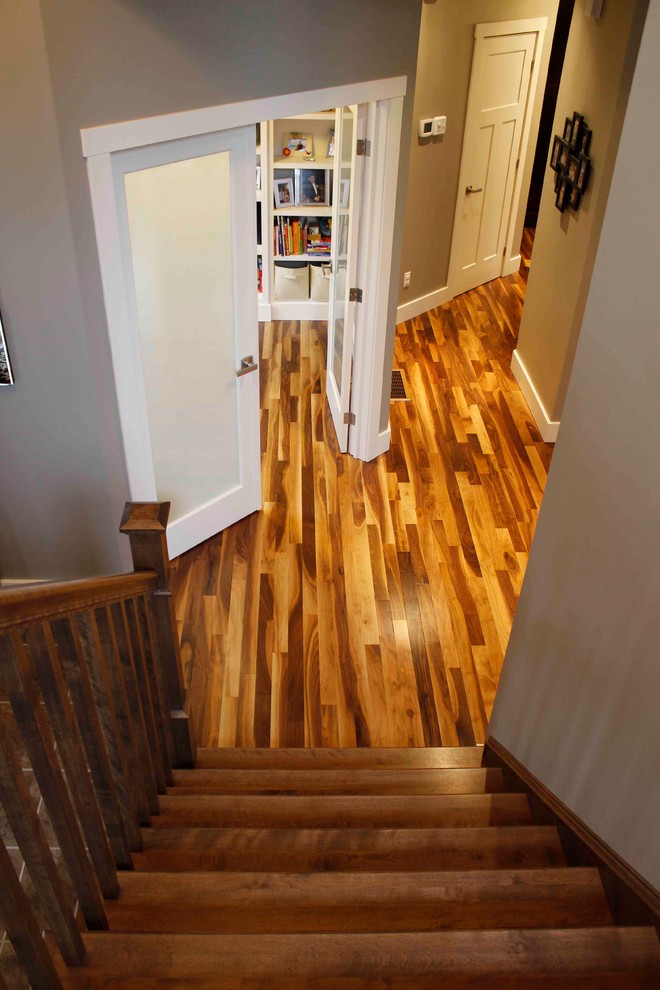 Inspiration for a medium sized modern wood straight staircase in Other with wood risers.