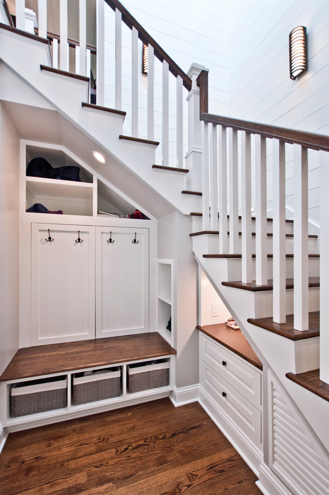 Example of a mid-sized transitional wooden l-shaped wood railing staircase design in Nashville with wooden risers