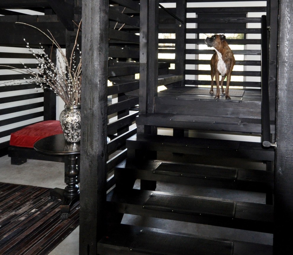 Réalisation d'un escalier sans contremarche minimaliste en U de taille moyenne avec des marches en bois et un garde-corps en bois.