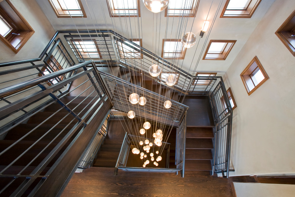 Foto de escalera contemporánea con escalones de madera