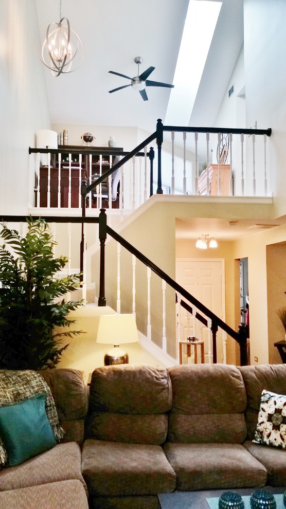 Example of a transitional carpeted u-shaped staircase design in Chicago with carpeted risers