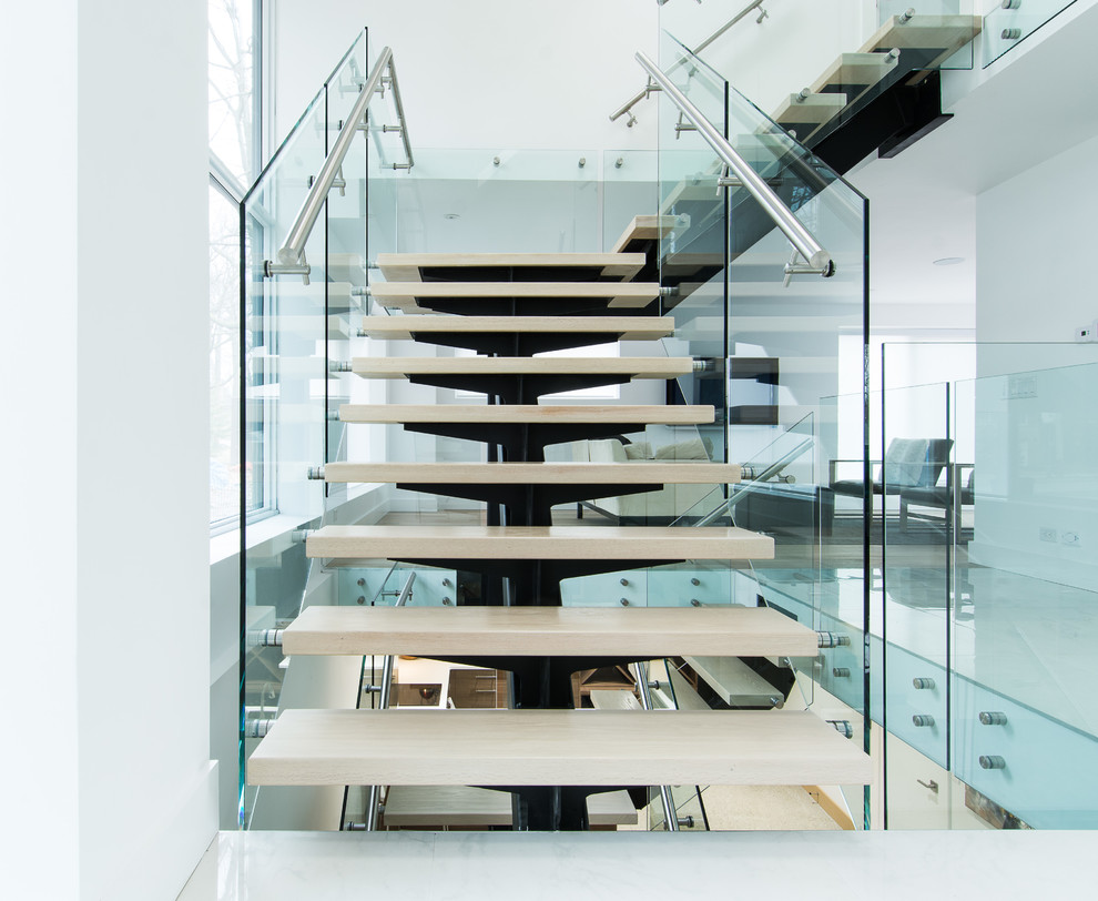 Diseño de escalera en L moderna grande sin contrahuella con escalones de madera