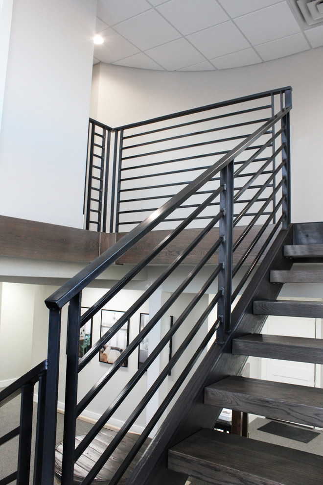 Design ideas for a contemporary wood l-shaped metal railing staircase in Salt Lake City with open risers.