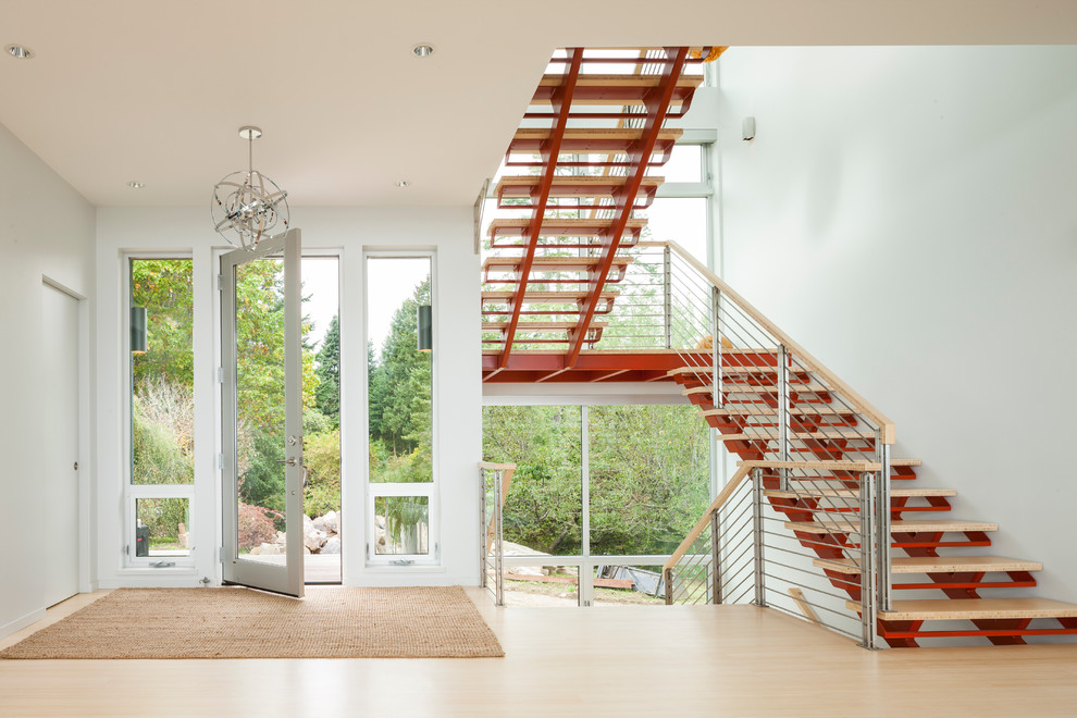 Mid-sized trendy wooden u-shaped open and cable railing staircase photo in Seattle