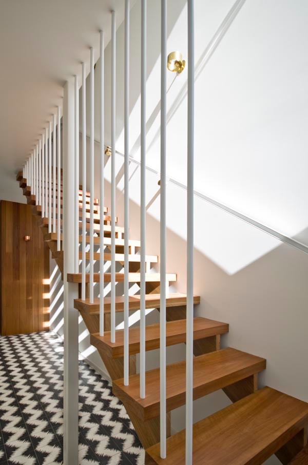 Design ideas for a medium sized contemporary wood straight staircase in Melbourne with open risers.