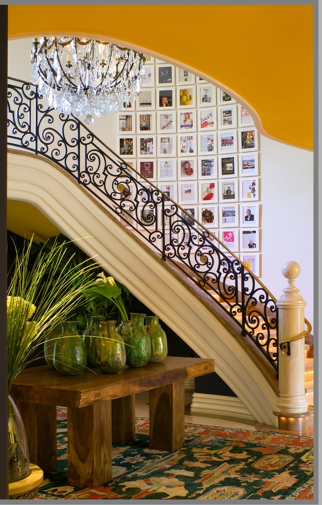 Staircase - mediterranean curved staircase idea in Los Angeles