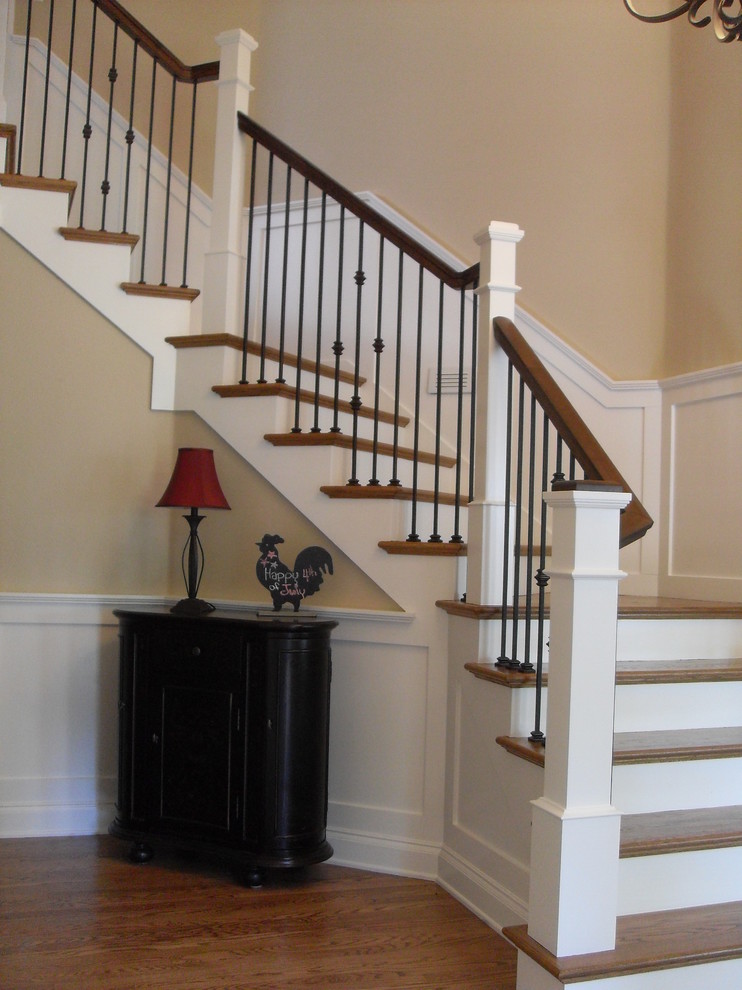 Classic staircase in Portland with feature lighting.