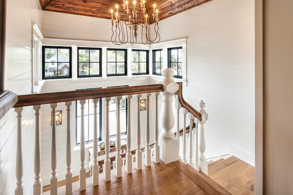 Inspiration for a rustic wooden staircase remodel in Charleston
