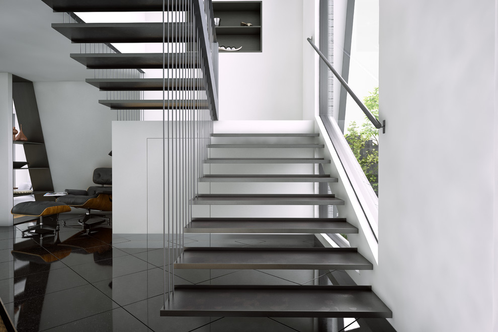 Large modern u-shaped staircase in Melbourne with metal risers.