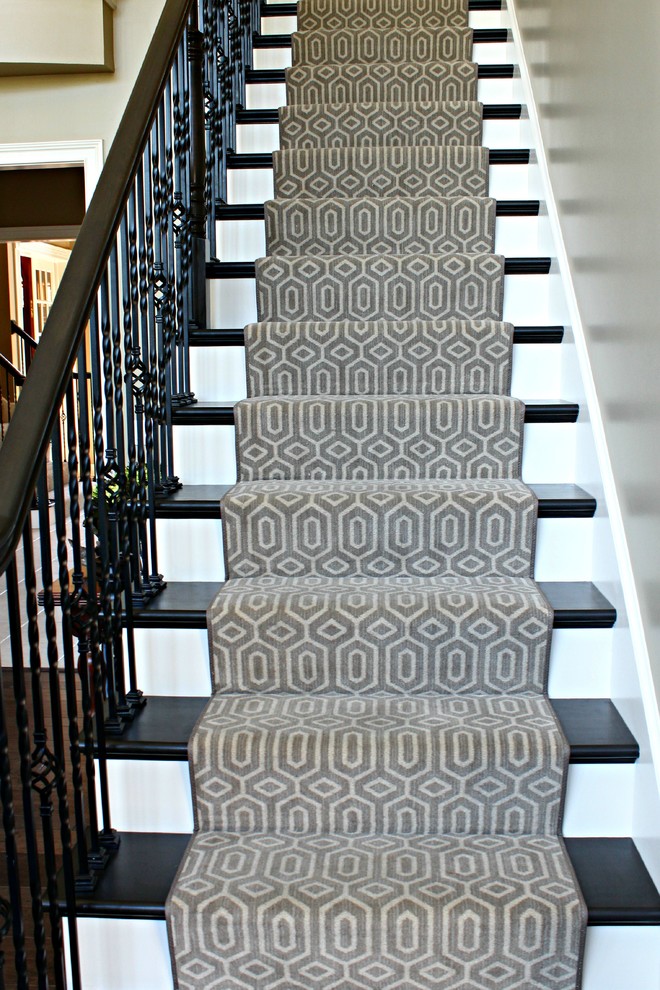 This is an example of a medium sized traditional staircase in St Louis.