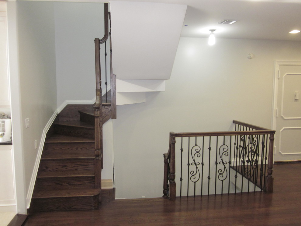 Inspiration for a medium sized classic wood curved staircase in New York with wood risers.