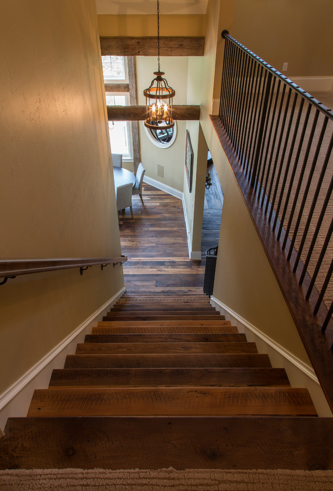 Staircase - mid-sized rustic wooden straight staircase idea in Other with wooden risers