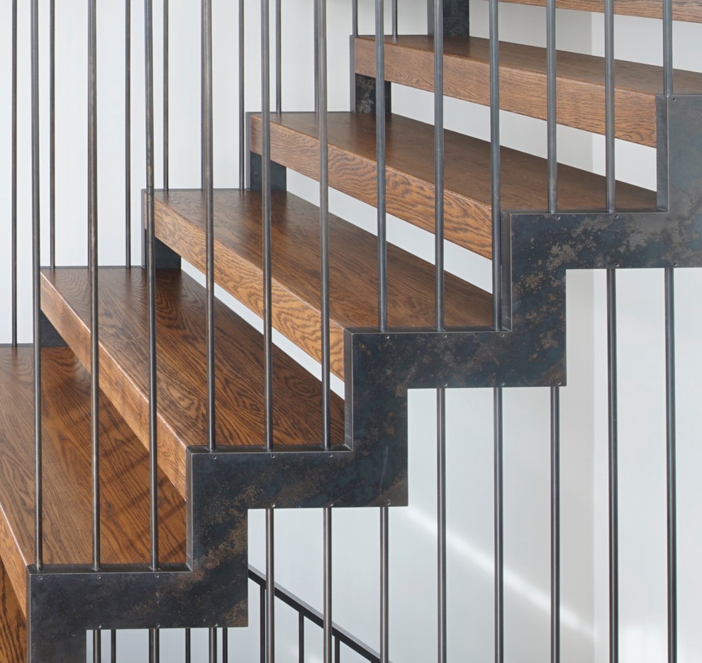 Photo of a medium sized contemporary wood u-shaped staircase in San Francisco with open risers.