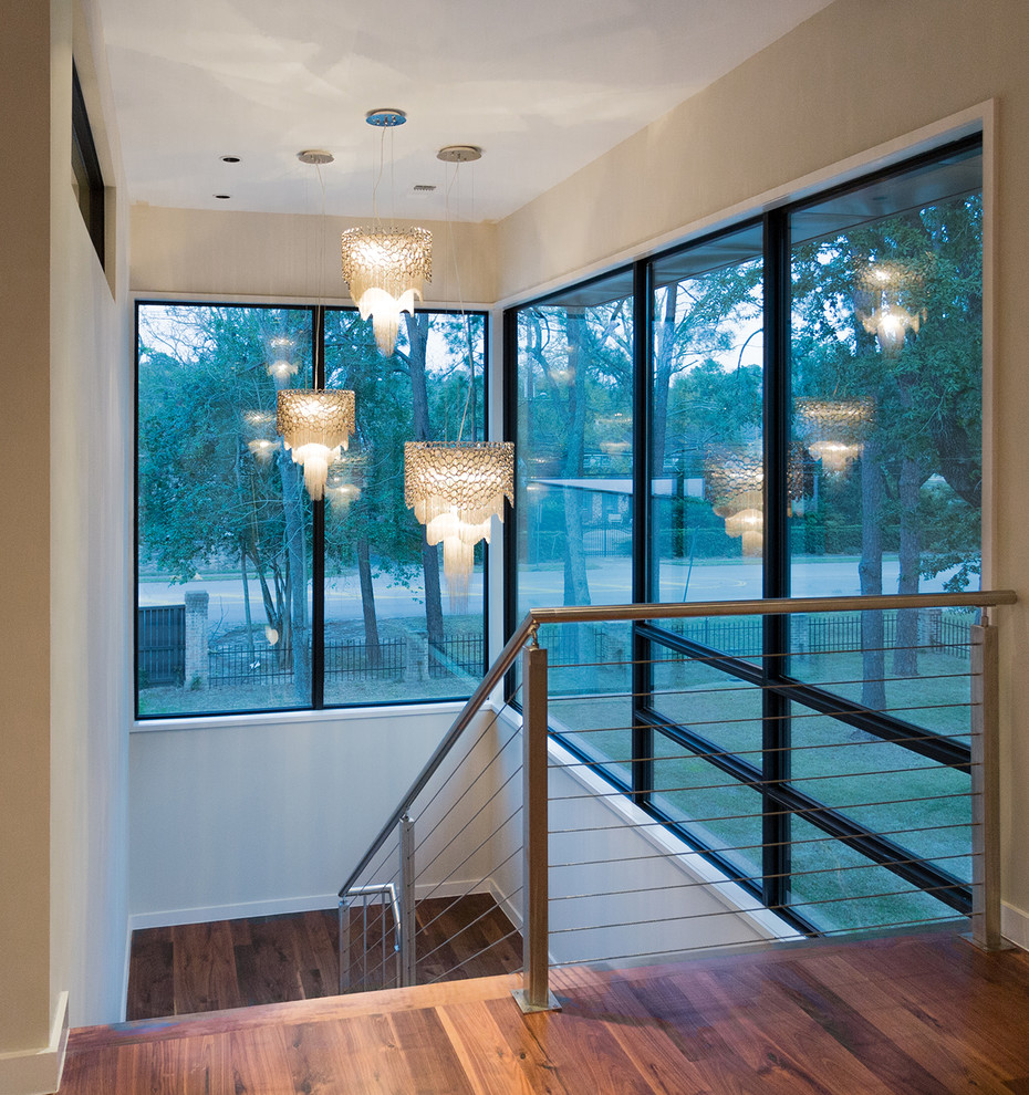 This is an example of a contemporary u-shaped staircase in Houston.
