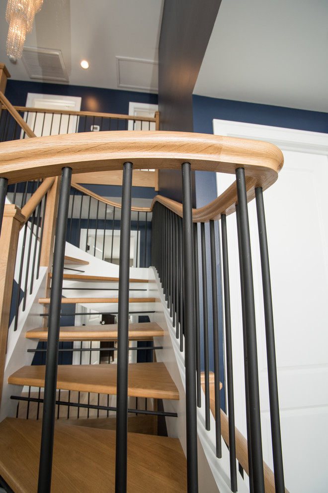 Example of a mid-sized transitional wooden floating staircase design in New York with wooden risers