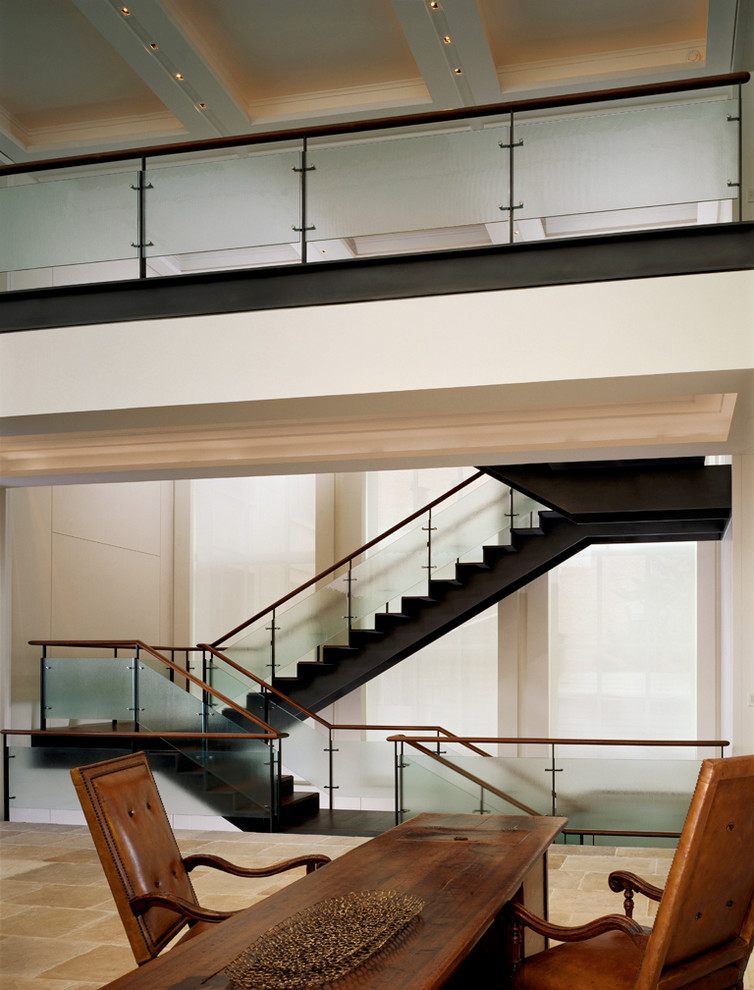 This is an example of a contemporary wood staircase in Chicago with metal risers.